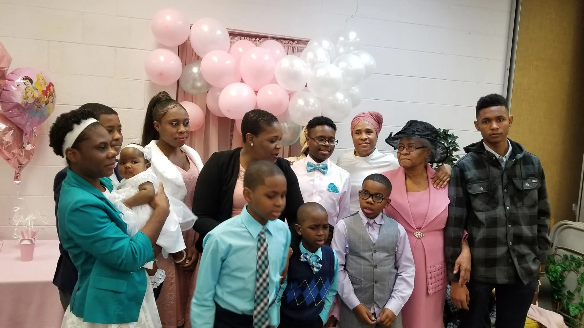 Adults and children gathered for a family celebration at Bethel